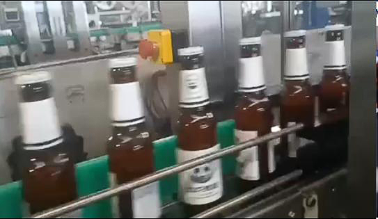 Nguyên lí hoạt động máy dán nhãn chai bia